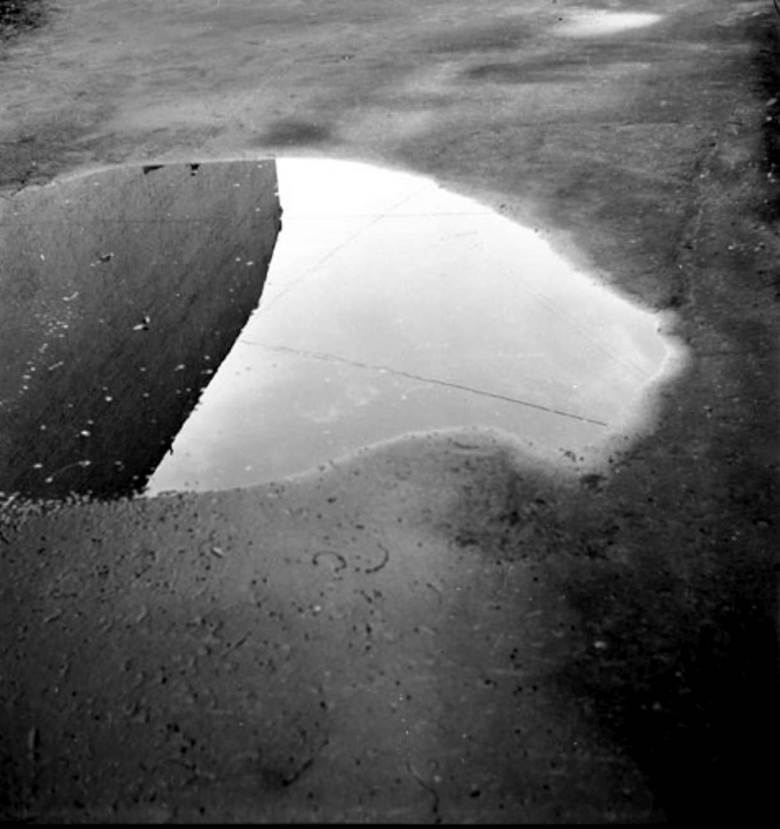 Alexandre Slusarev pothole and clouds Moscow 1977